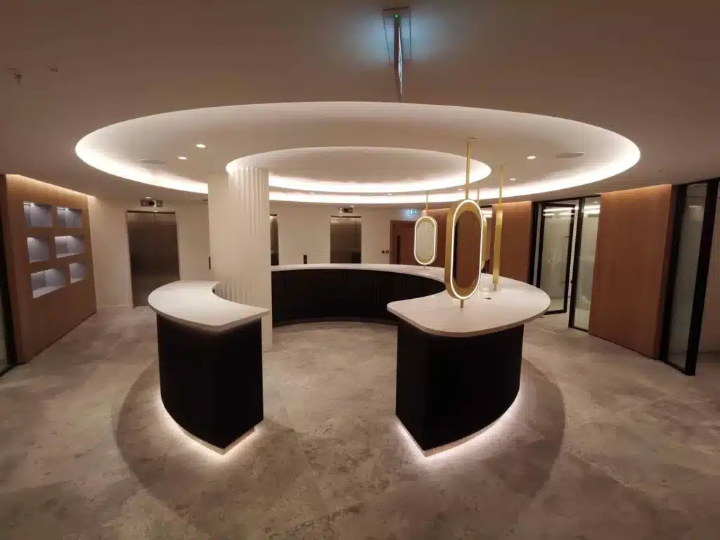 Curved and veined reception desk made using Solid Surface