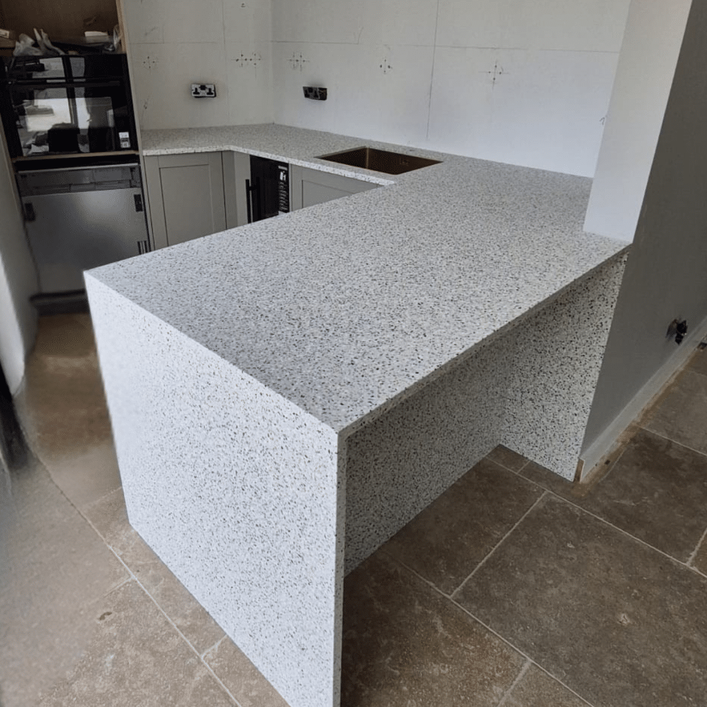 Terrazzo island unit with side panel
