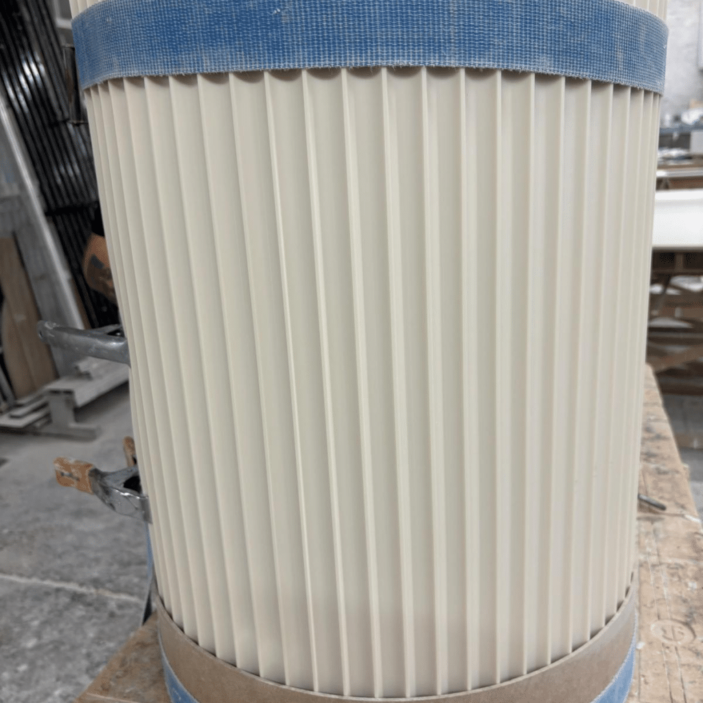 Thermoformed and Fluted Solid Surface retail unit in white 