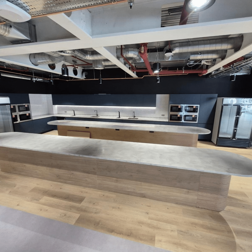 Finished Staron Solid Surface Kitchen Island Units -seamless Solid Surface worktop installation on commercial fit out project