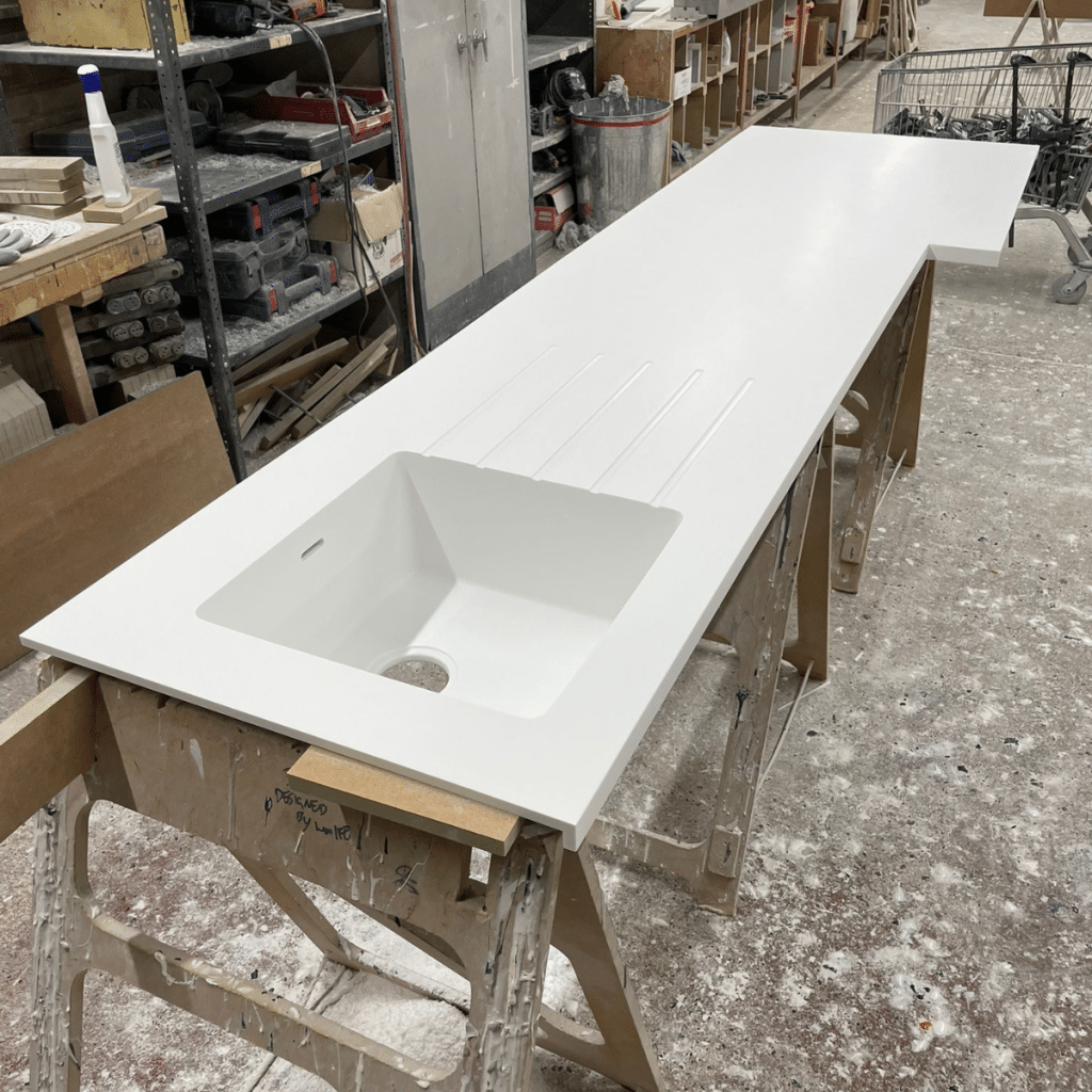 white kitchen unit with inset sink